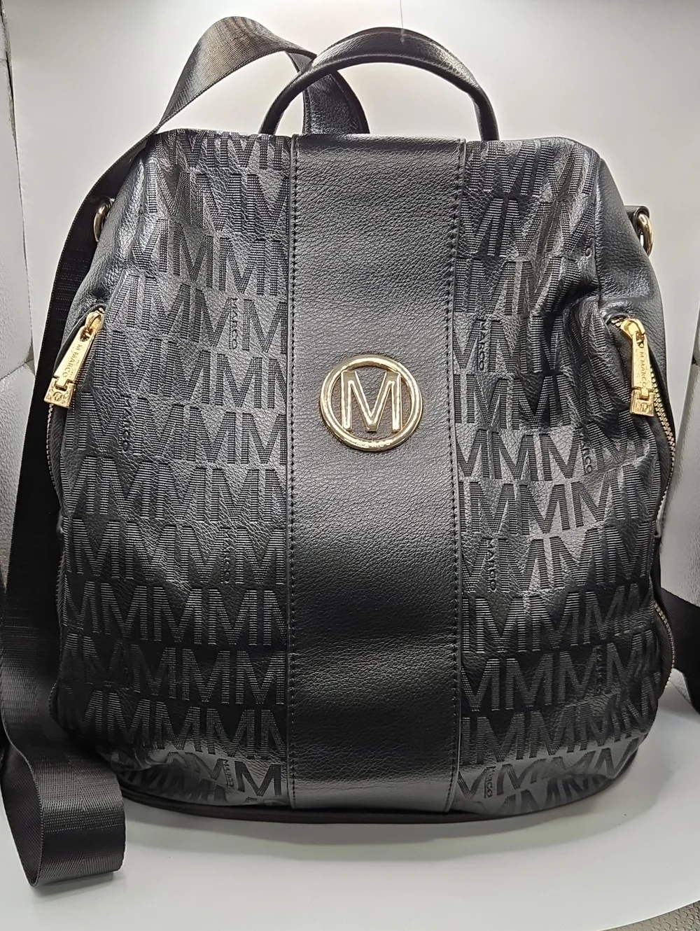 ⭕️ M Marco - Monogrammed Vegan Leather Backpack. Great Shape All Zippers Work